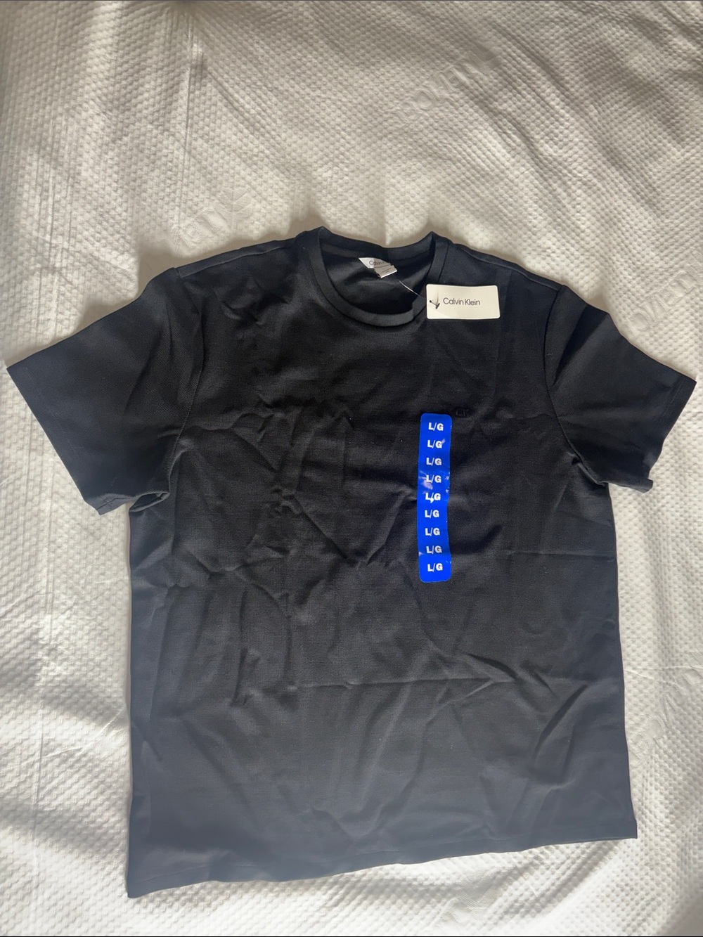 Calvin Klein Black Short Sleeve Crew Neck Tee with Blue Size Tag